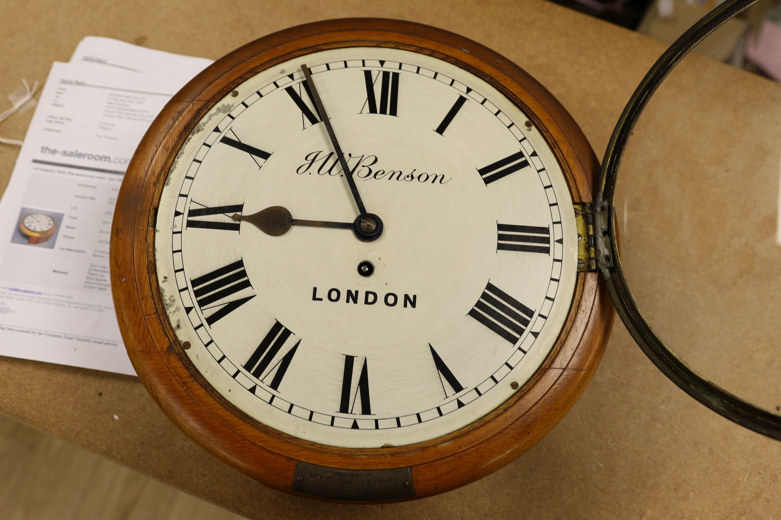 A Victorian oak-cased dial clock, signed JW Benson, London, 38 cms diameter.